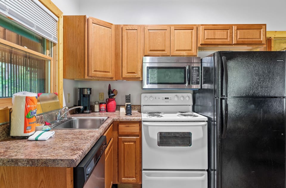 Make coffee, cook dinner, or prep for a picnic—your cabin kitchen has everything you need.