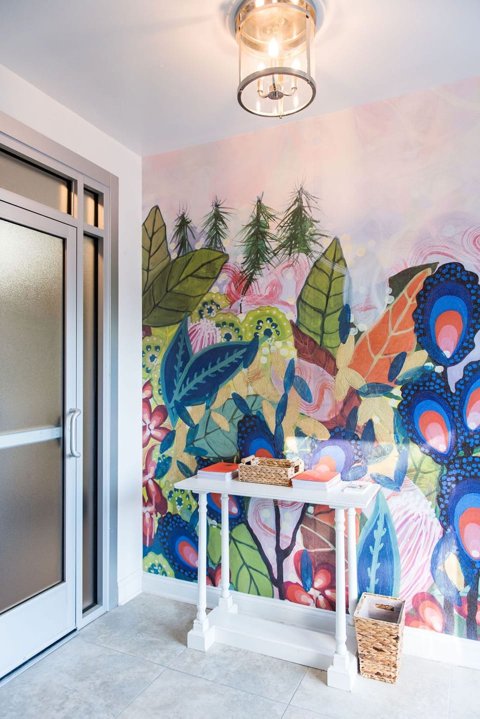 Alex K Mason artwork on wall in foyer.