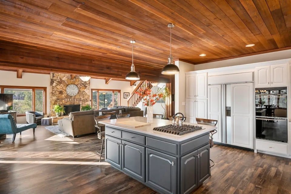 Our open-concept kitchen flows seamlessly into the dining and living areas. 