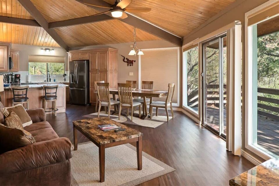 There is a dining table that seats 6 guests with direct access to the private deck for meals under the Sedona skies