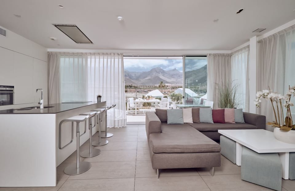 Sink into the cozy sofa after a day exploring the area.
