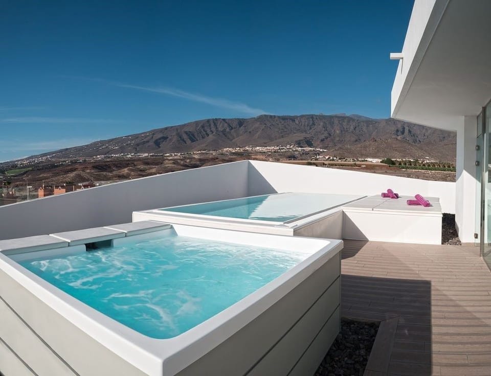 You will love the spacious wrap around terrace with hot tub!