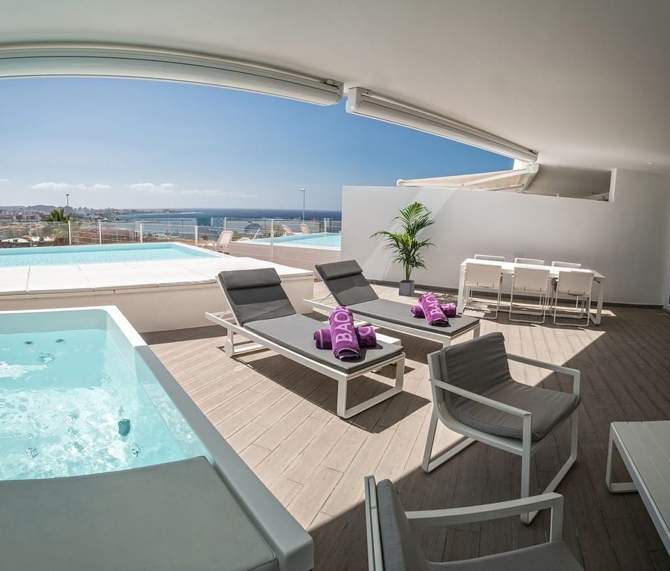 Soak up the sunshine by your private pool.