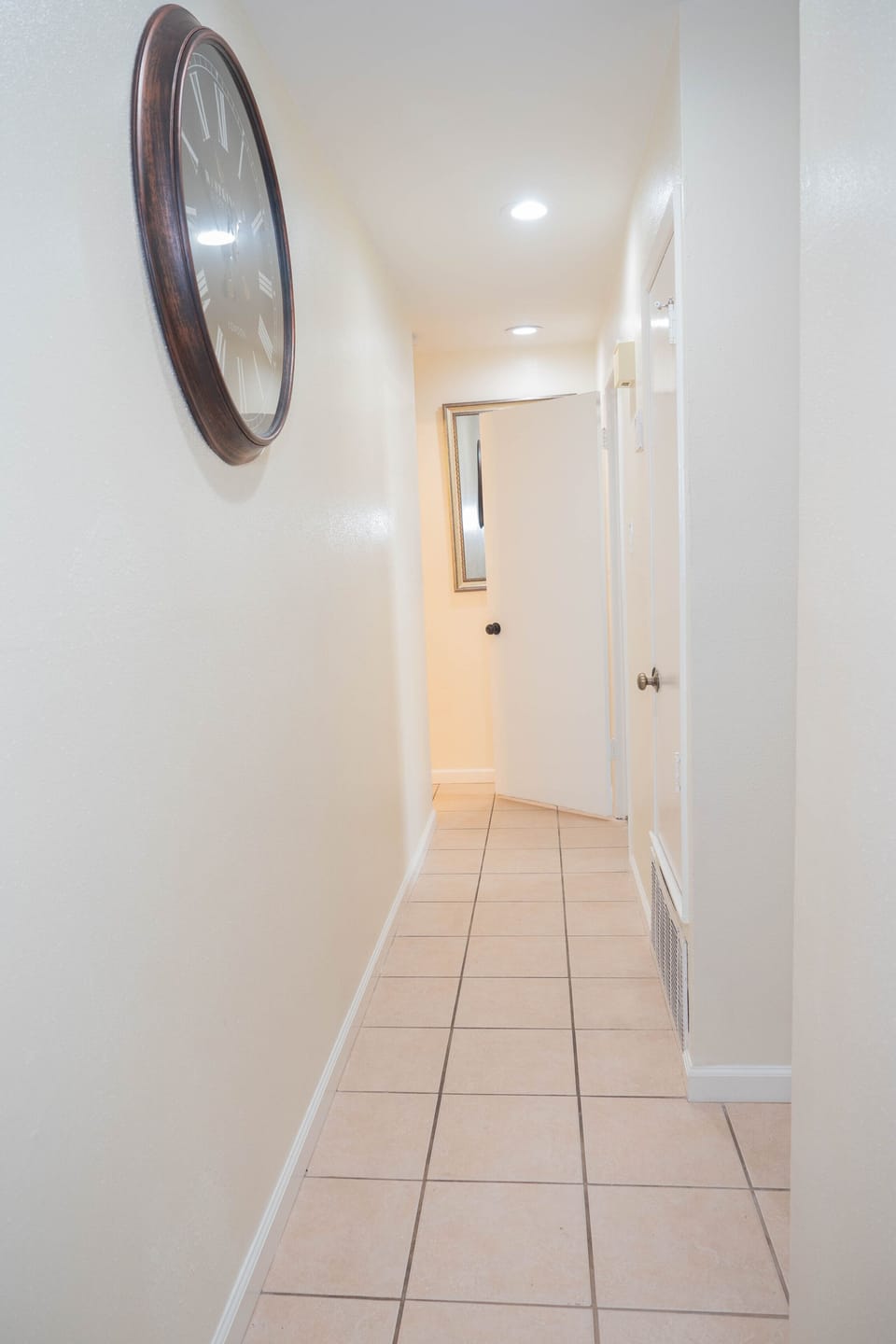 The property features a hallway that leads to the bedrooms and bathrooms.