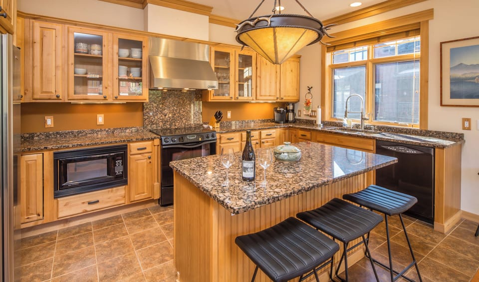 Spacious Kitchen with Granite Counters- Bar Seating for 4