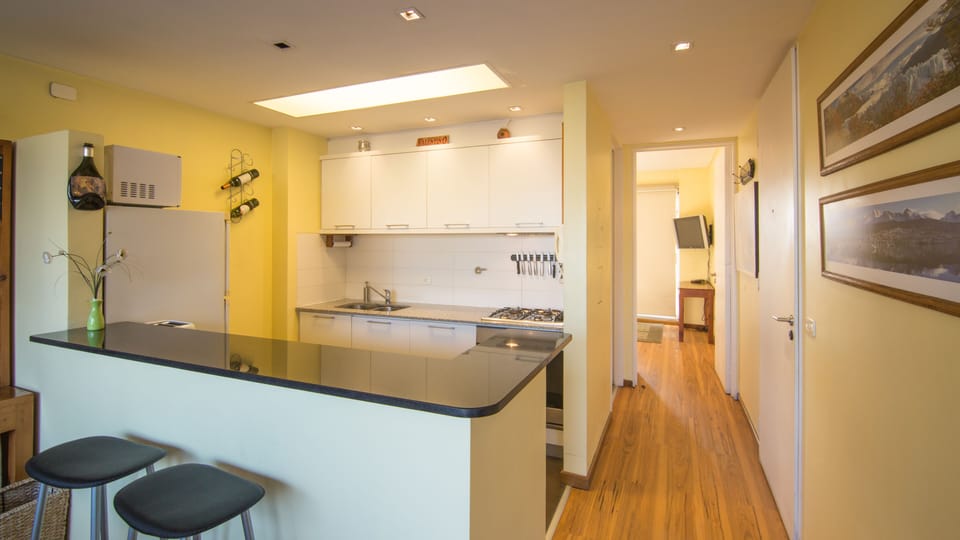 Kitchen and hall.  Entry on right