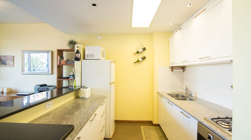Very functional with every imaginable appliance.  Gas range & electric oven