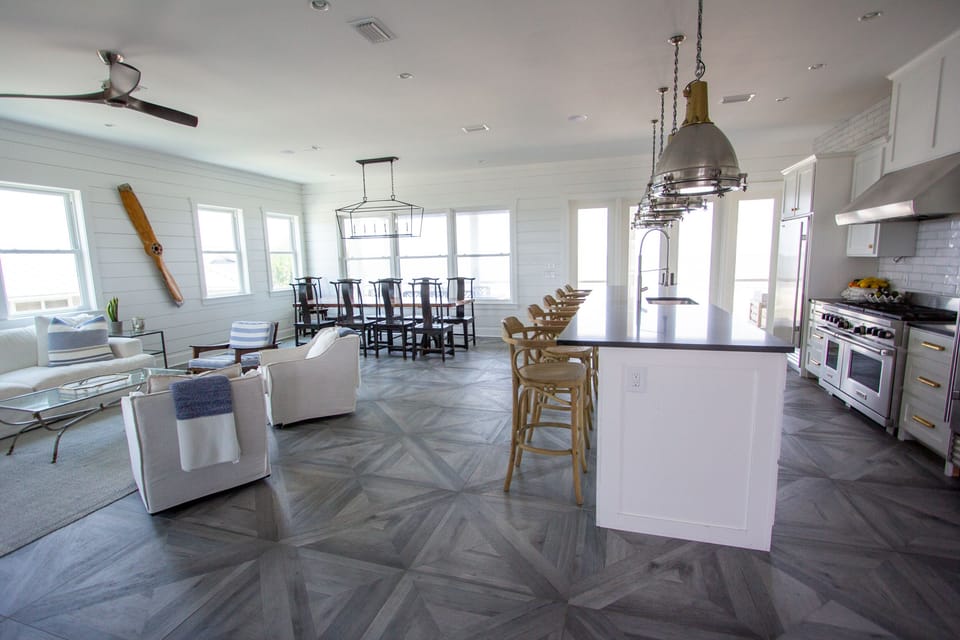 main floor living area, windows face beach