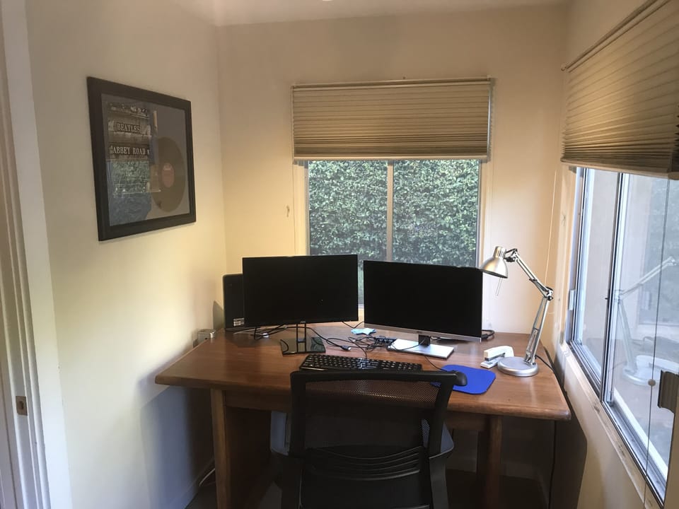 Office work area with dual monitors
