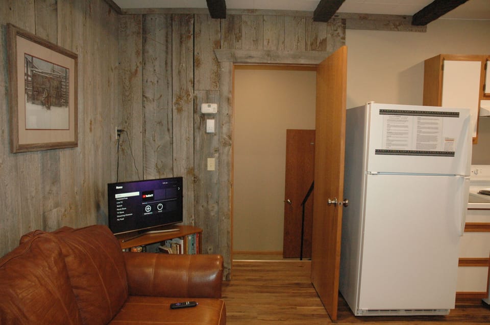 A smart tv, games and books provide entertainment at the house