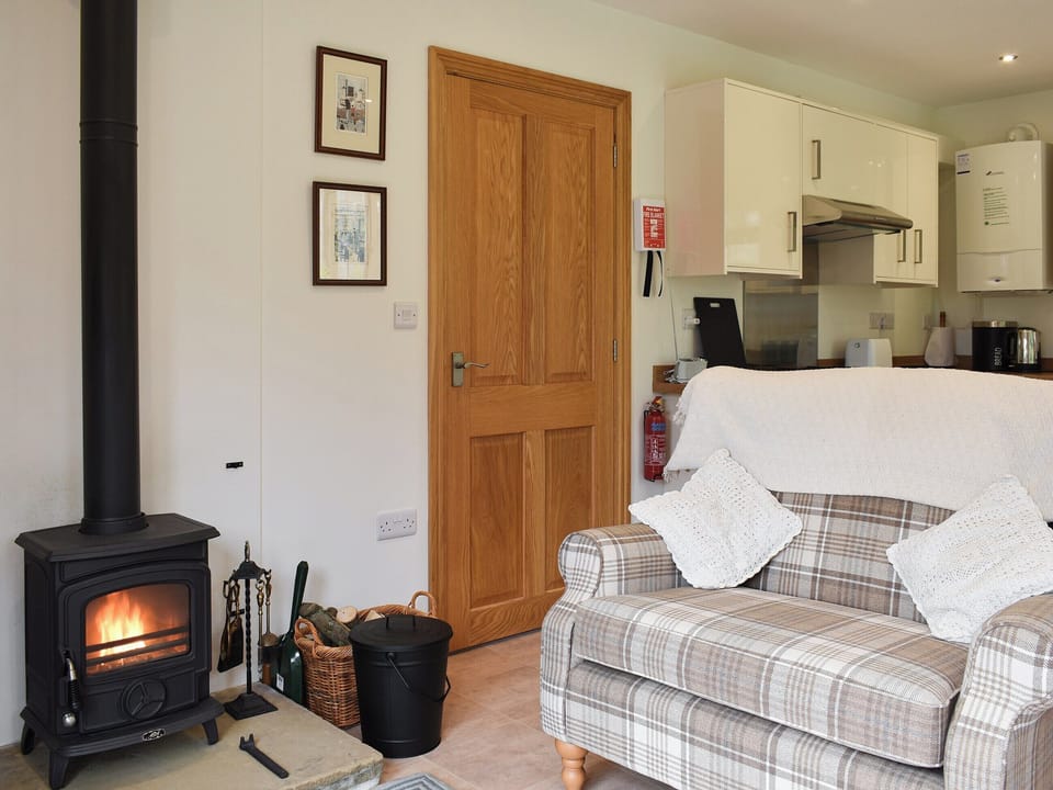 Open plan living space with wood burner | Brooklands Cottage, Bellerby, near Leyburn