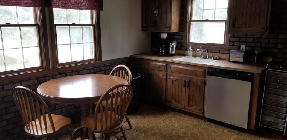 Table and sink area - Stainless steel refrigerator for use and dishwasher