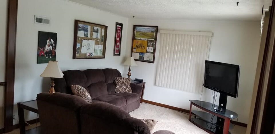 Living room area - New furniture along with HD Television with plug in options