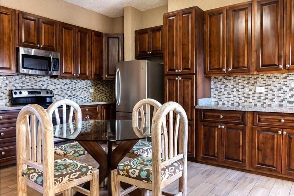 Large well appointed kitchen and table to seat 4.