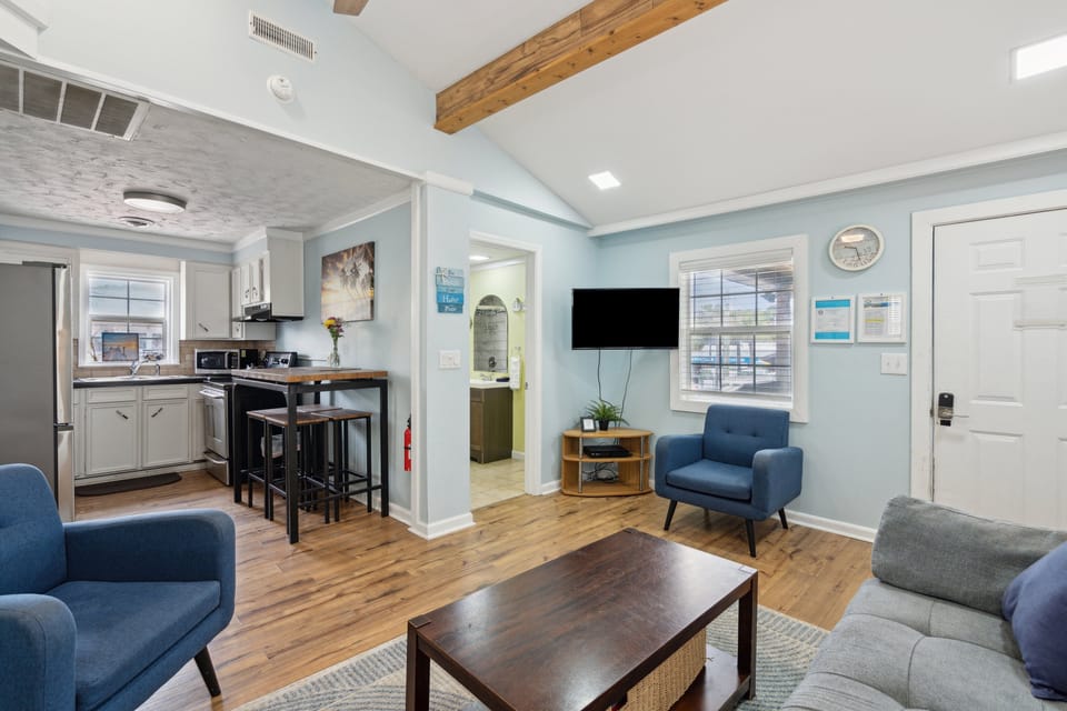 Another view of the open concept kitchen, dining and living space.