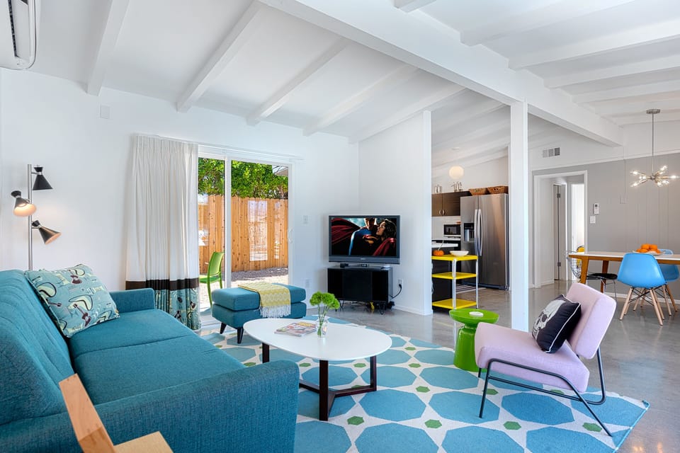 Comfortable seating and flatscreen TV with blu-ray player for watching movies