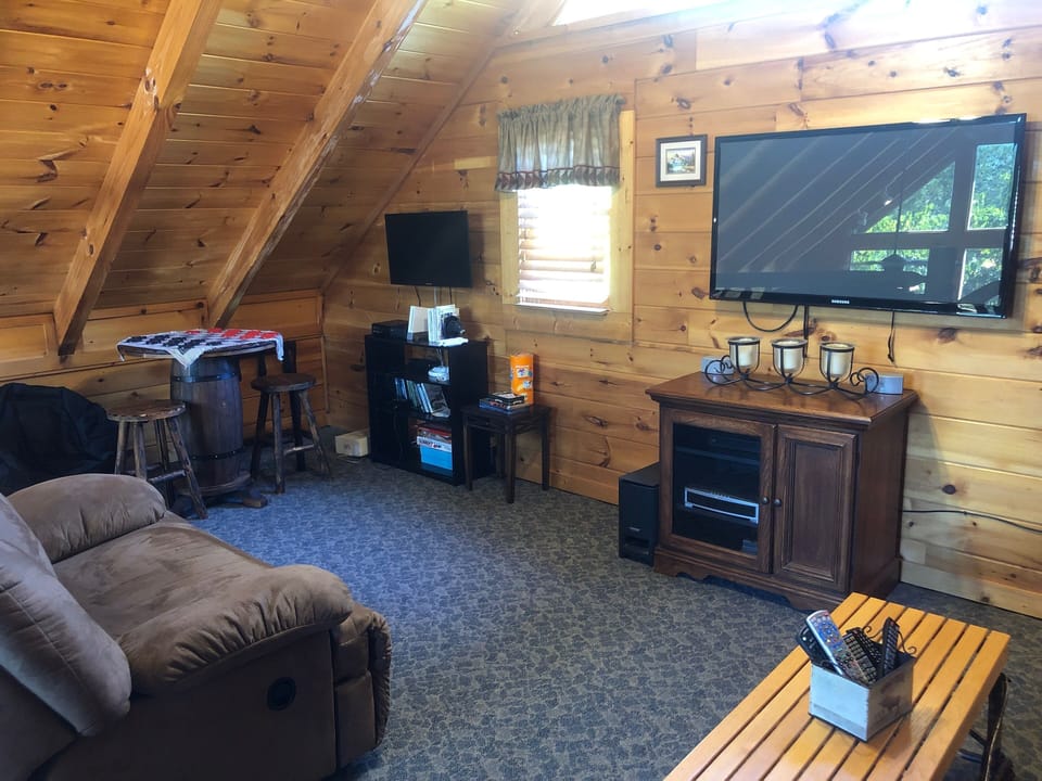 Bonus game room upstairs with sleeper sofa