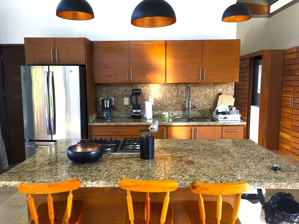 Coffee maker, toaster, blender, stainless pots & pans and utensils  provided