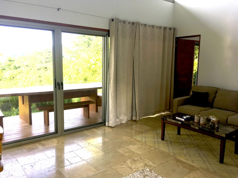 Sliding glass doors open completely for air flow