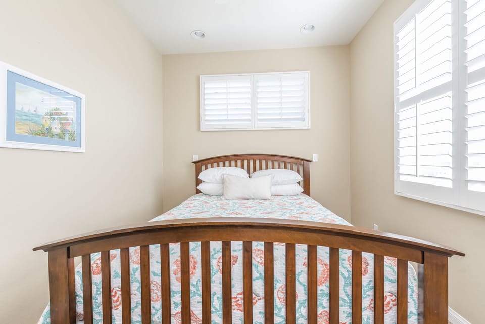 The third bedroom is located on the second level and includes a queen bed.
                