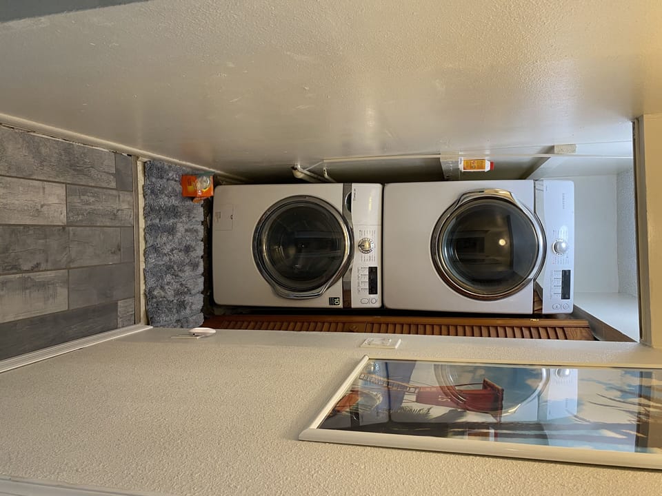 Full size washer and dryer inside unit