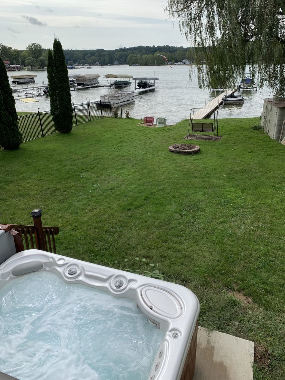 Six person hot tub overlooking the beautiful lake.