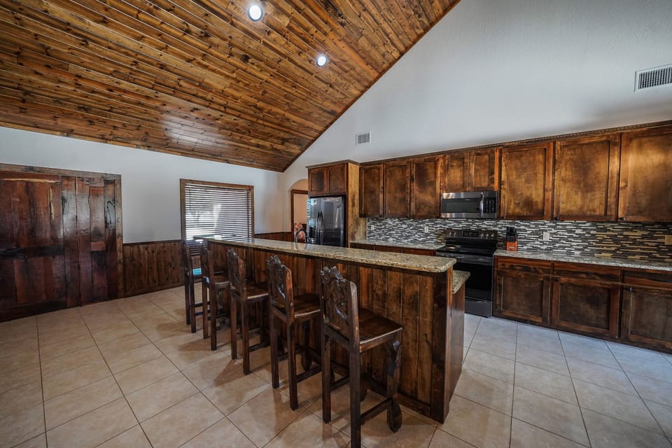 Kitchen + bar seating view