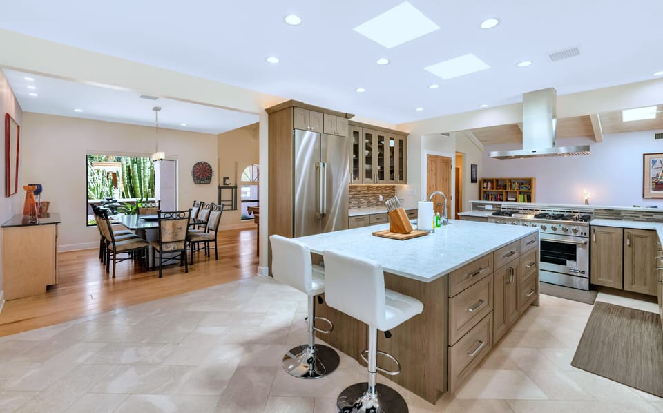 Gourmet Kitchen: 42” fridge/freezer w/easy access to the dining and living rooms