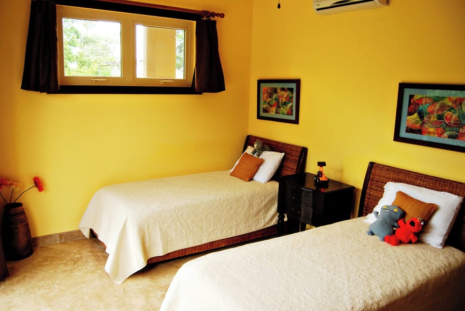 Twin beds in second bedroom