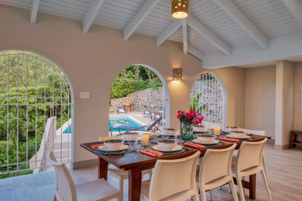 Dine on the covered Lanai next to the pool