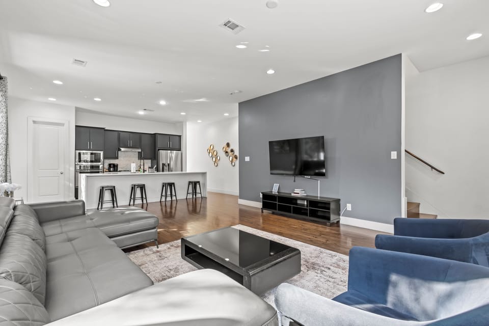 Open concept living room and chef's kitchen