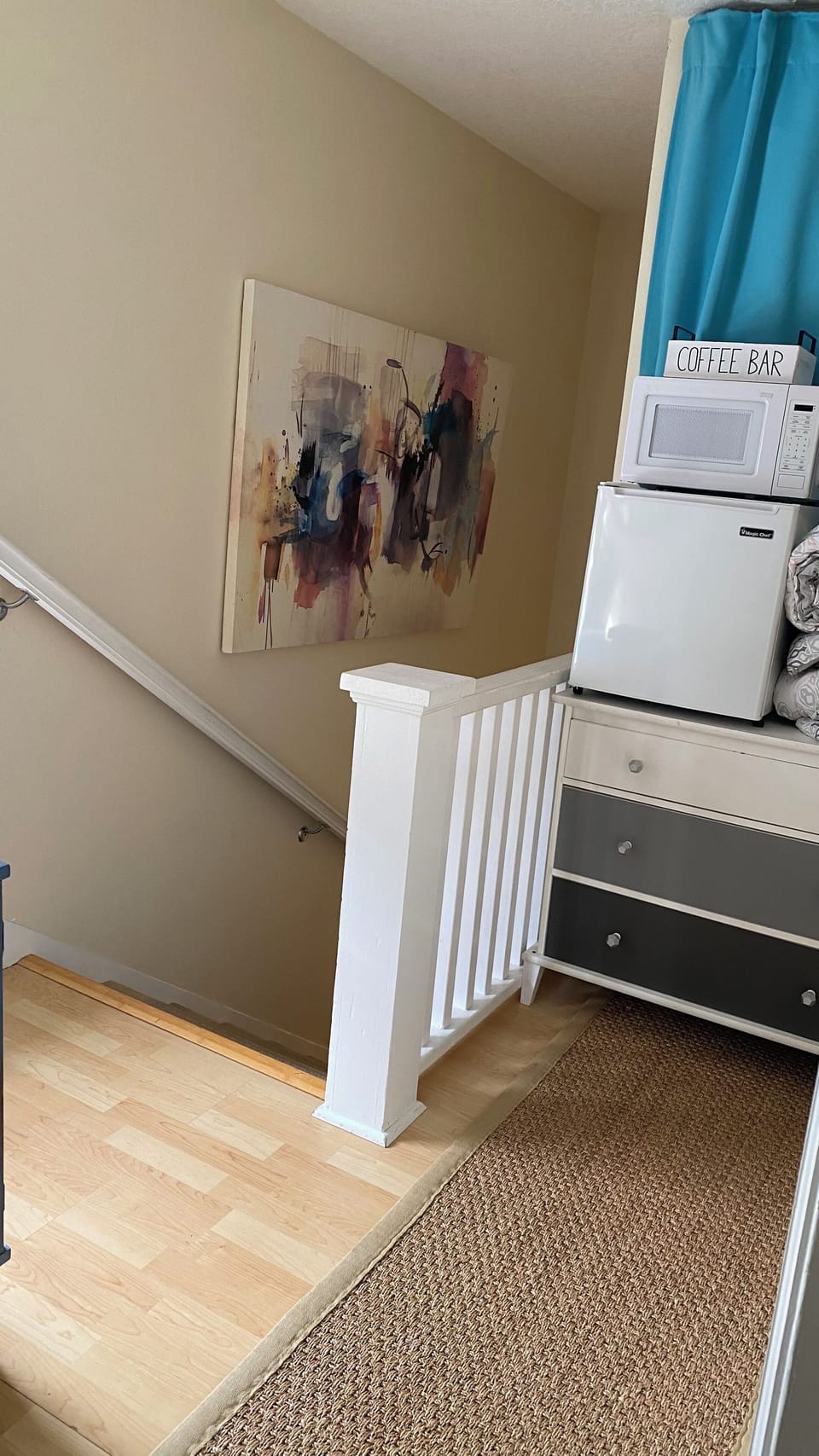 Upstairs landing area with fridge, microwave and coffee station