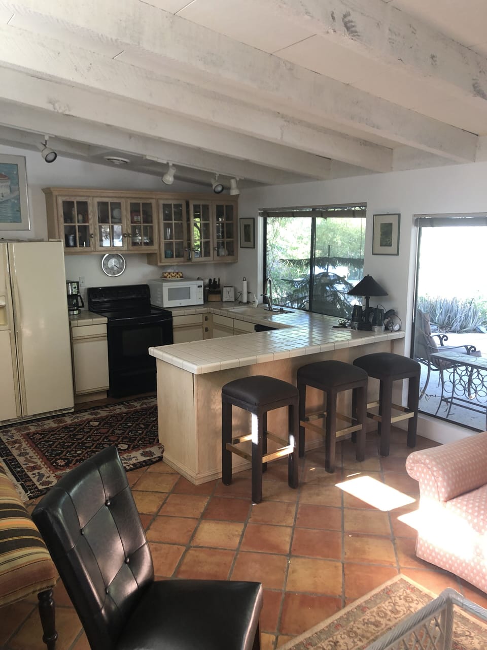 Open kitchen, New stove and dishwasher.