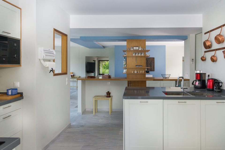 The spacious and practical kitchen is fully equipped to serve all your cooking needs