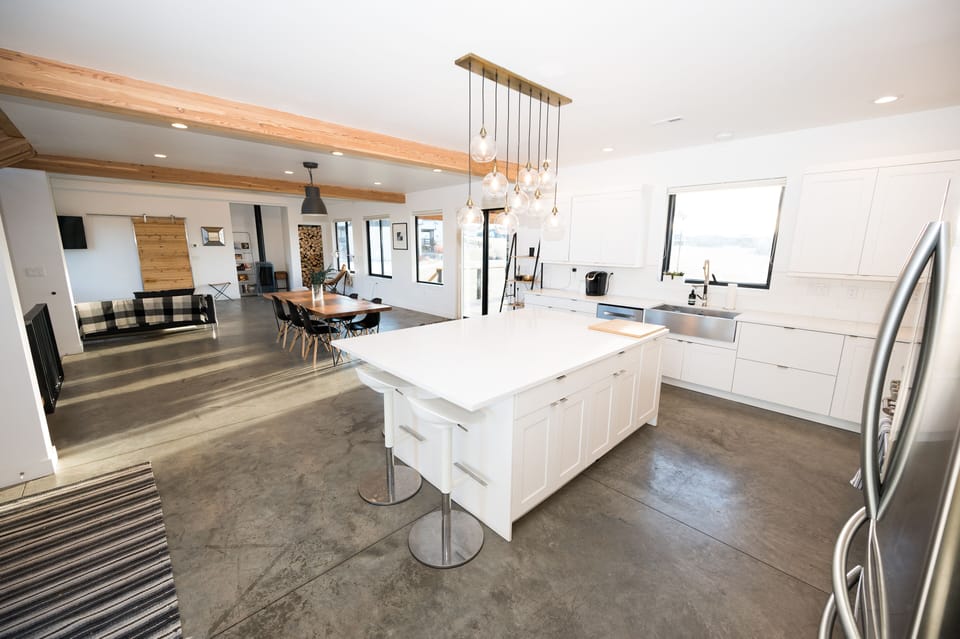 View of the grand room. Kitchen/Dining/Living.