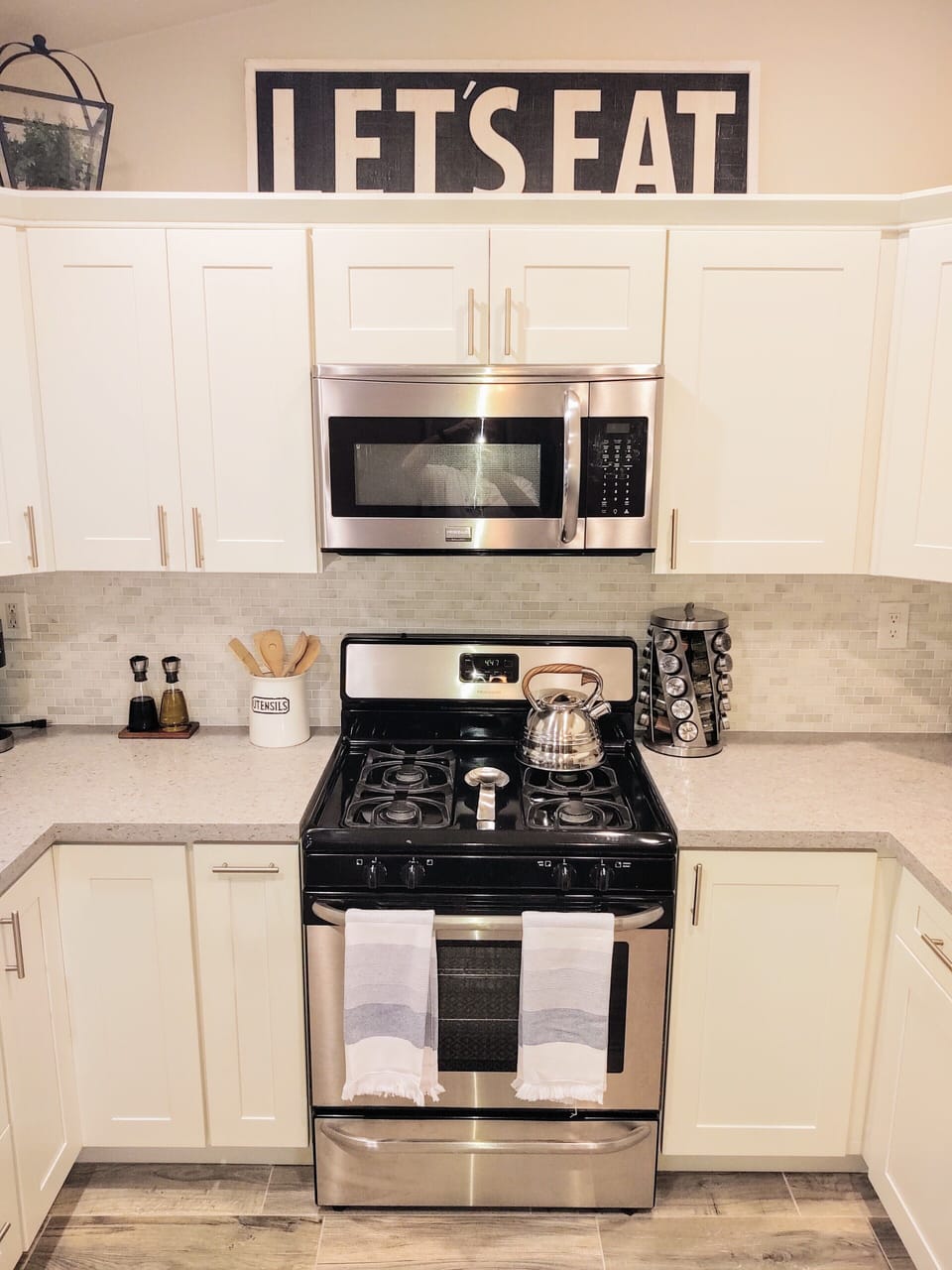 Microwave, gas stove top and oven. 