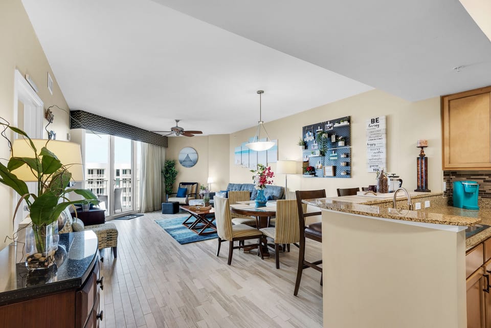 View of the living/dining as you enter the condo-roomy and lots of natural light
