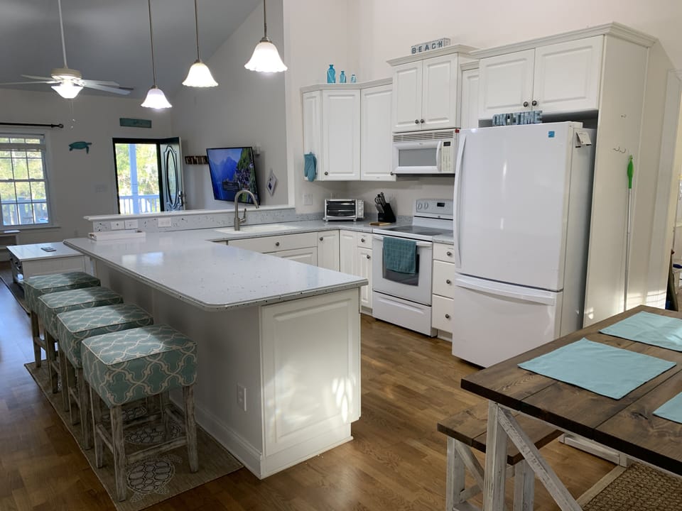 Open Kitchen to the Kitchen eating area and living room