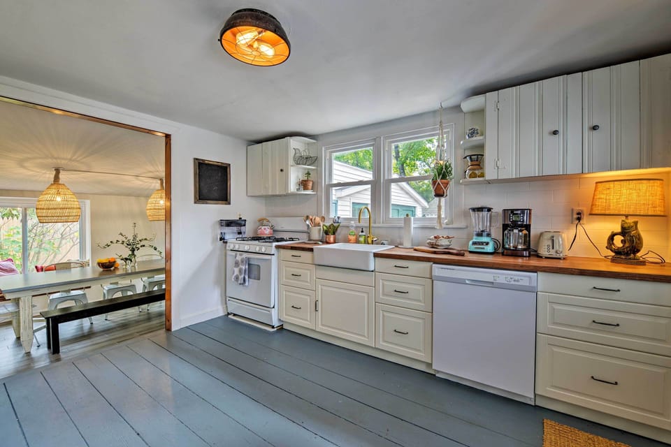 Through the open hallway, you'll discover the fully equipped kitchen.