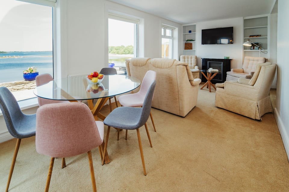 Lounge room and dining area are overlooking the lake