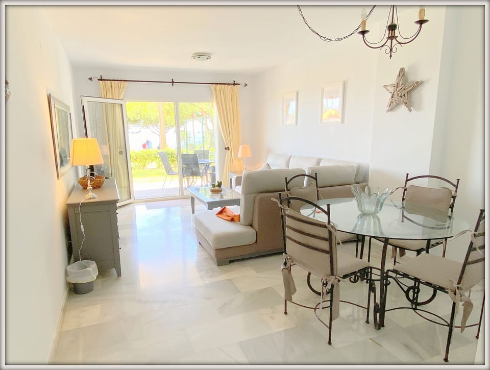 Living/Dining room 
Opening onto private terrace and garden
With Security