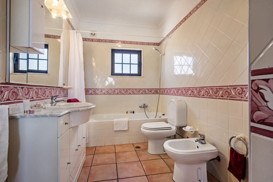 1rst floor Bathroom bath over head shower and wc