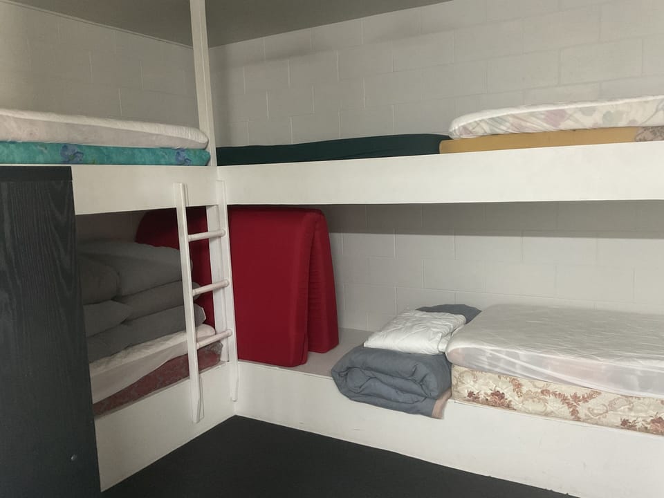 Bunk room with eight bunks.
