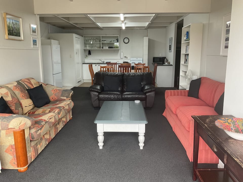 Living, dining, kitchen and bunk room on ground floor
