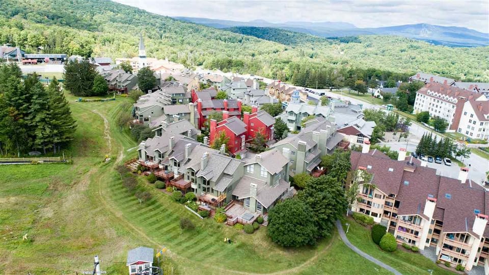 Mountain Watch Building is adjacent to Stratton Village