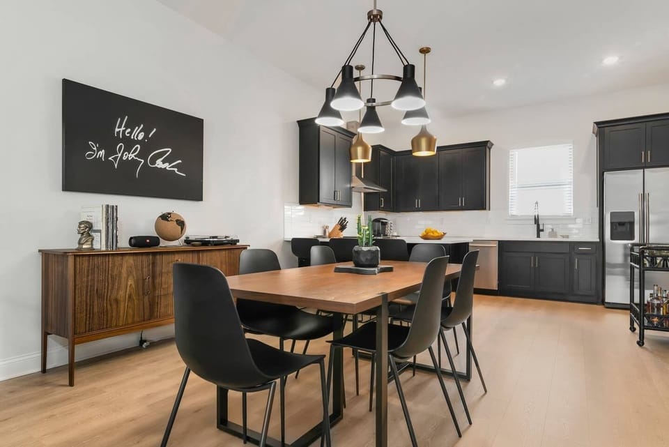 Plenty of seating at the dining table and kitchen bar
