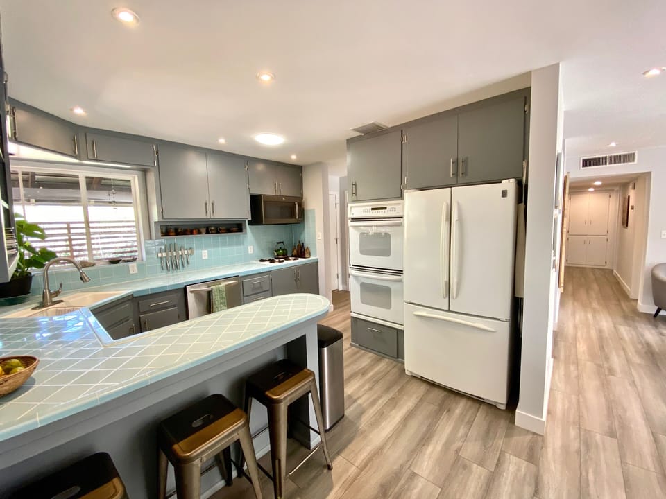 Kitchen is open to dining and living room areas. House has a great open layout.