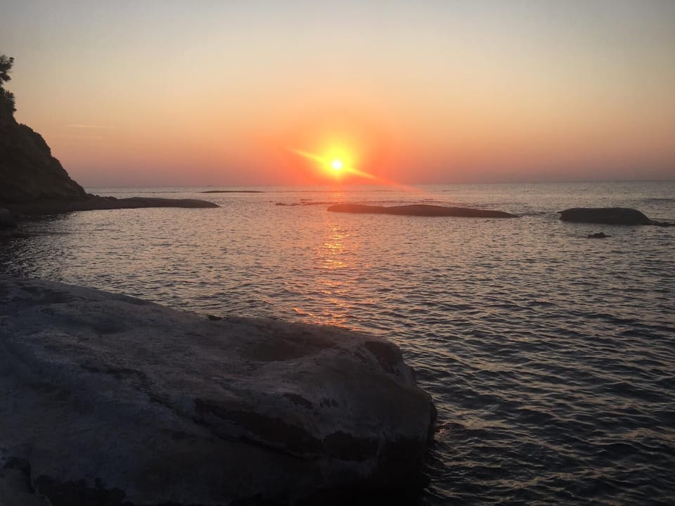 Sunrise over the sea from the local beach - 5 mins walk at around 6.30am!!