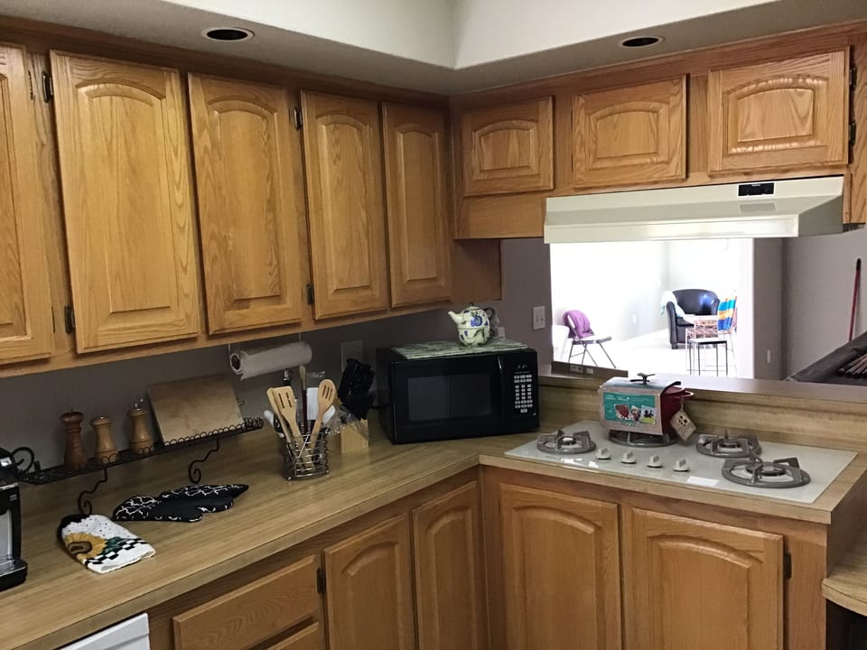 Completely equipped cooks Kitchen with microwave , gas stove & oven 