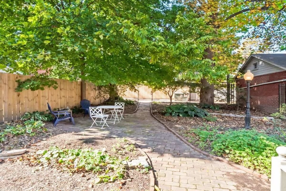 Sit under the trees with a cup of tea and a good book in the charming garden #GardenEscape